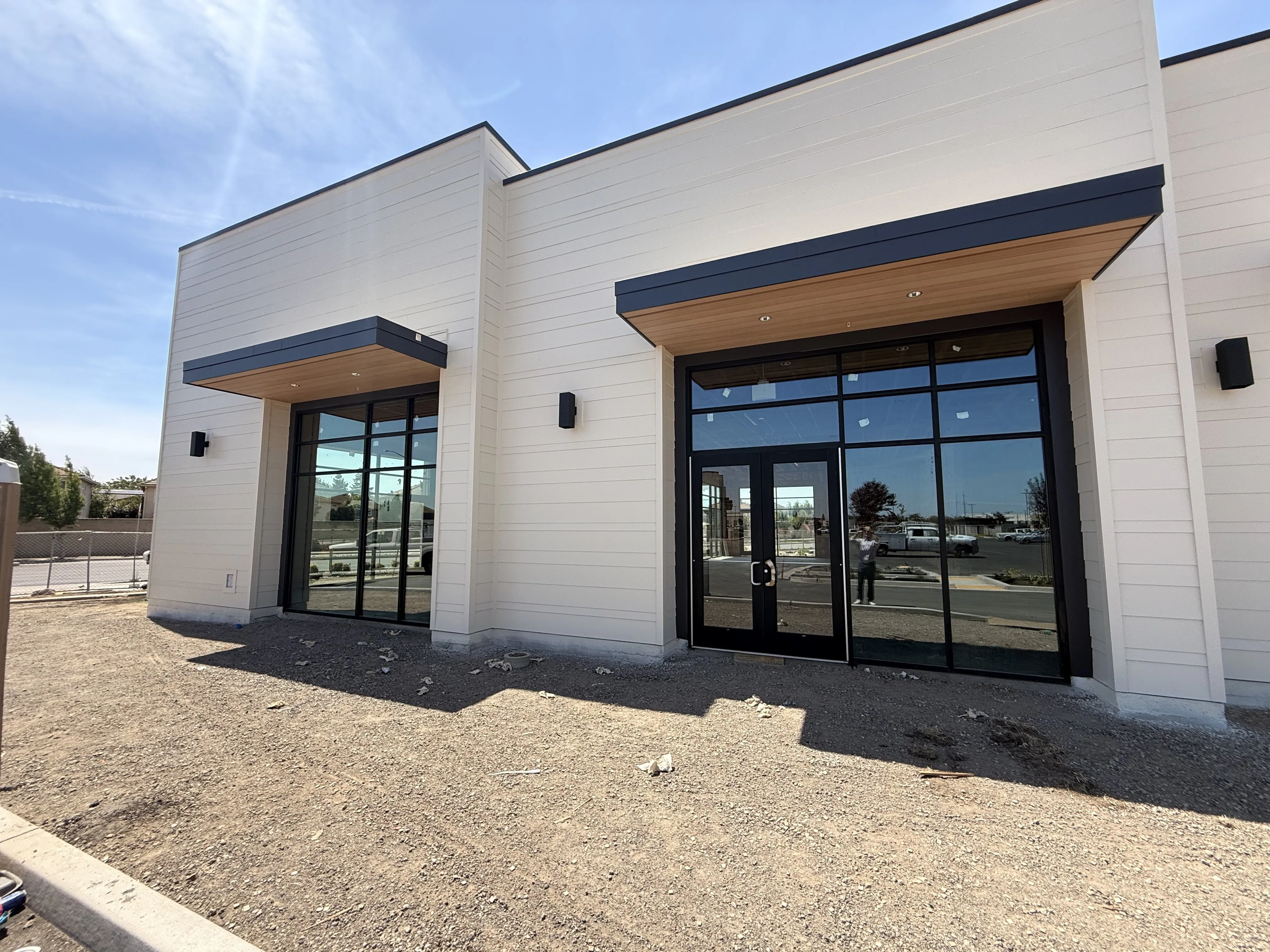 Storefront entrances of suites 101 and 102 in Shops H