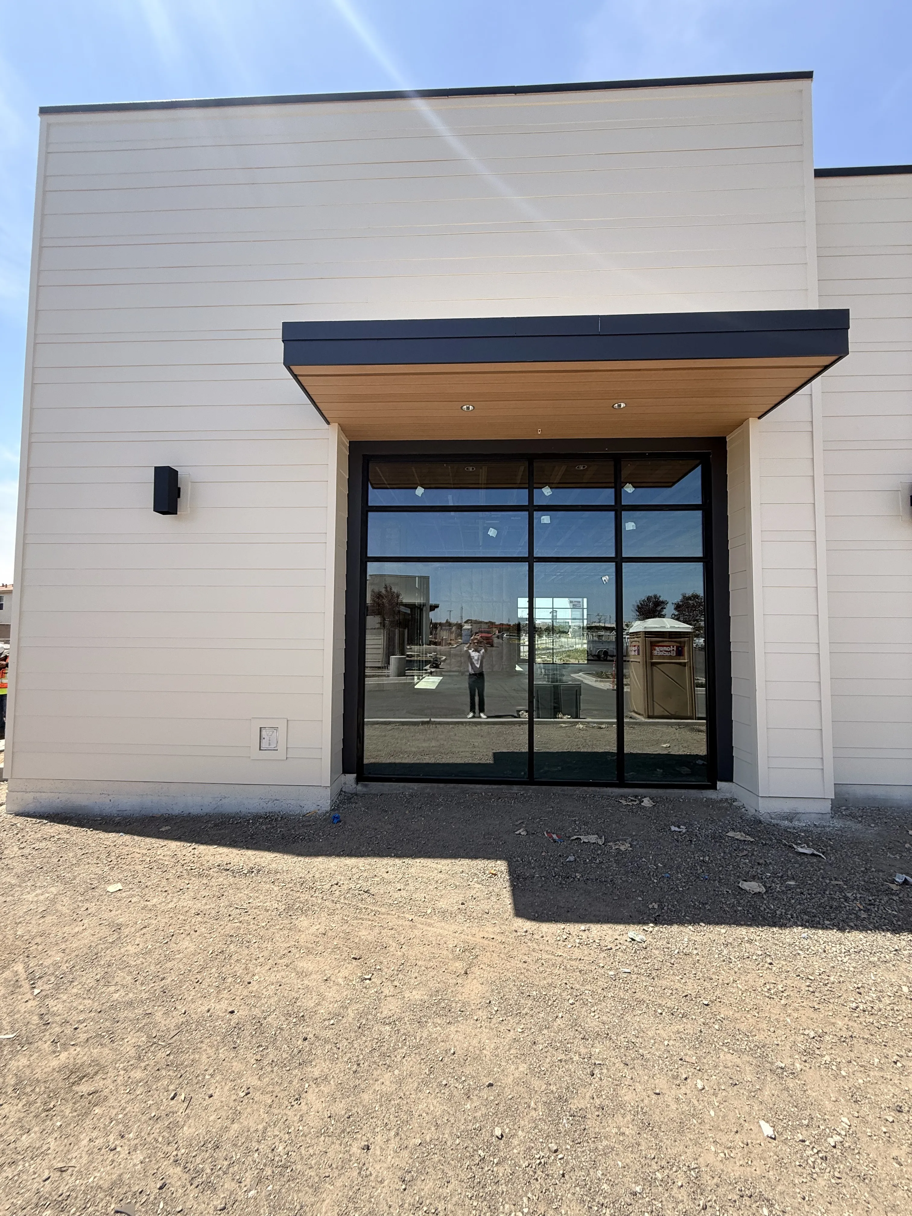 Storefront entrance of suite 101 in Shops H